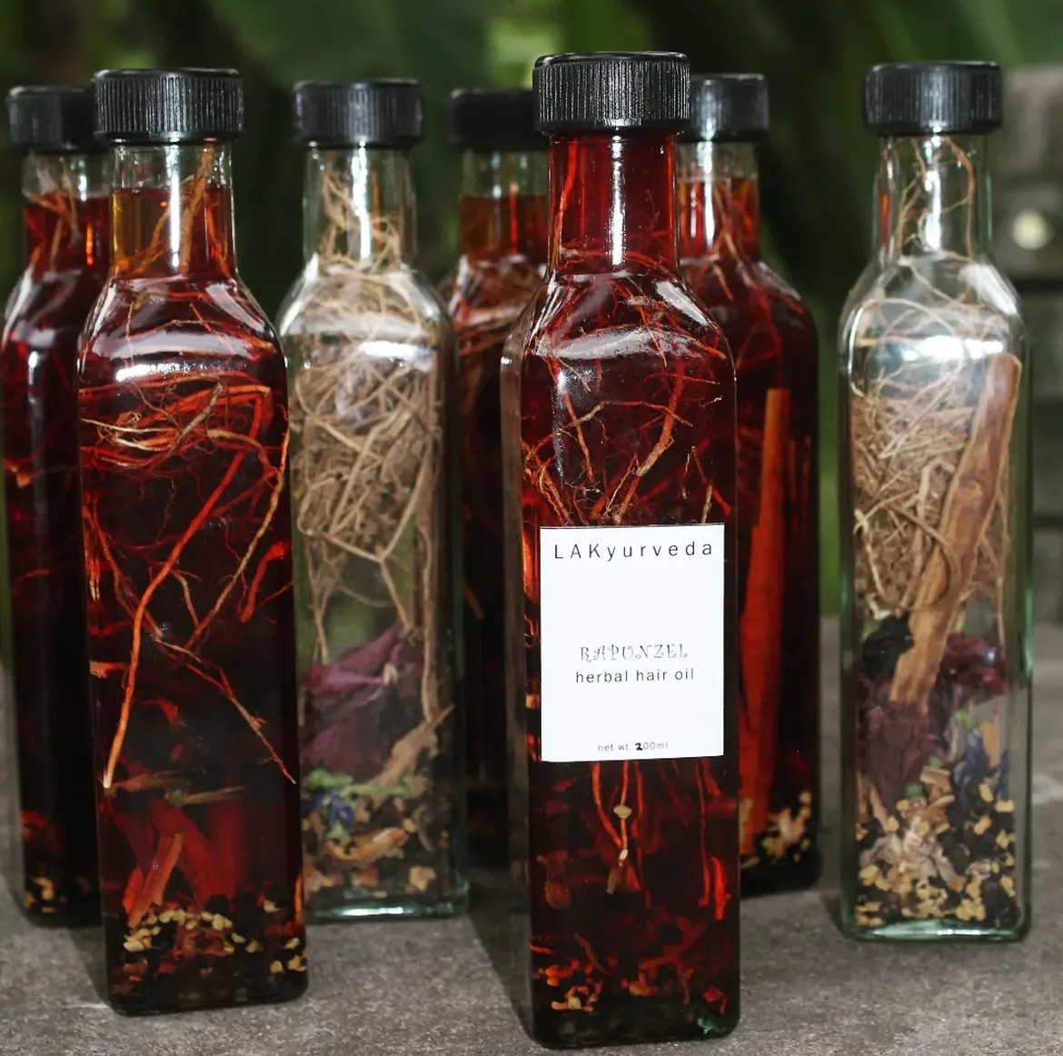 LAKyurveda Rapunzel herbal hair oil bottles